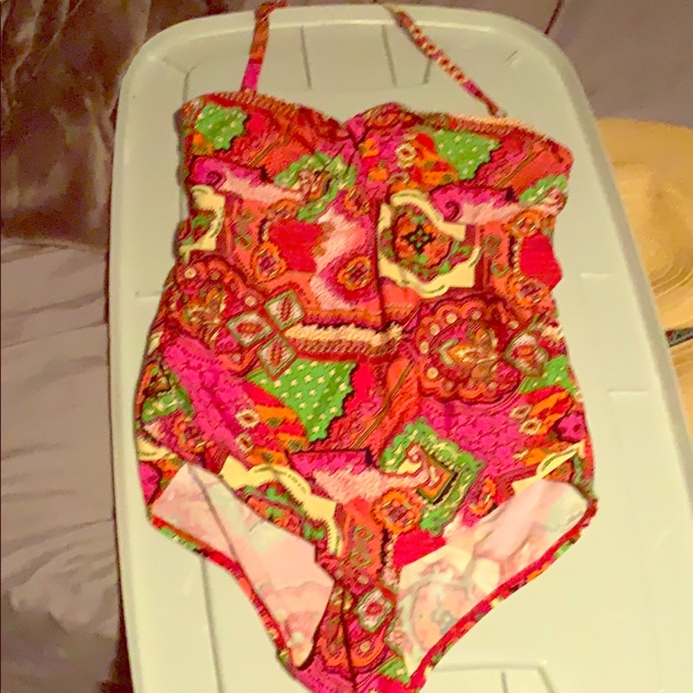 One piece baiting suit with interchangeable strap